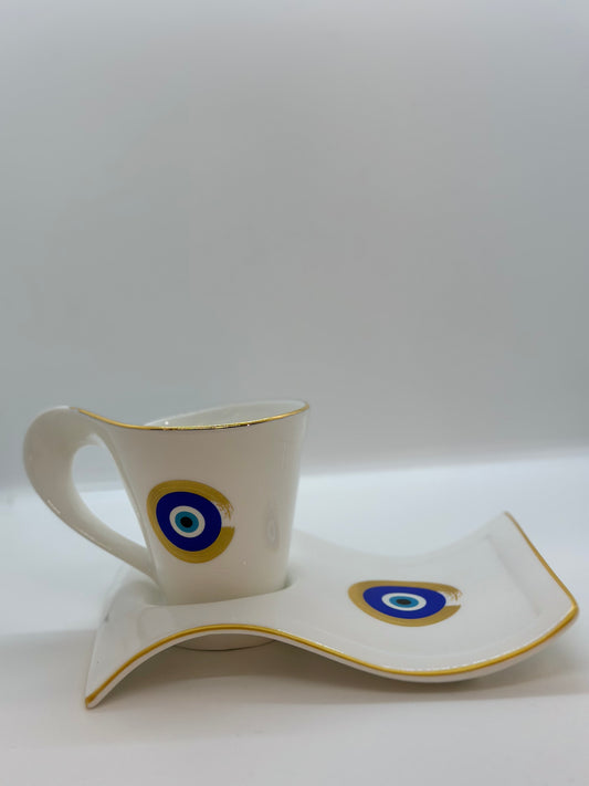 Creme coffee cup with eye